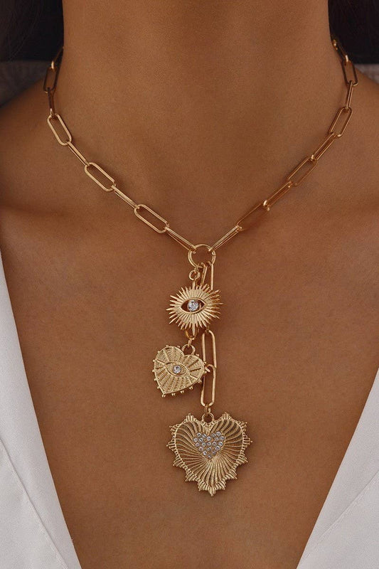 SUN HEART CHARM NECKLACE: GOLD