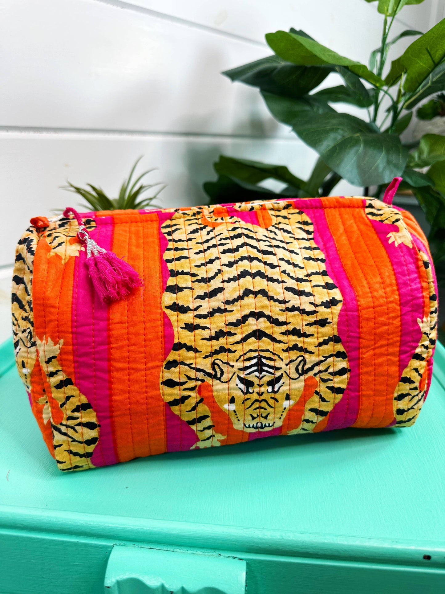 QUILTED TOILETRIES BAG: CORAL TIGER