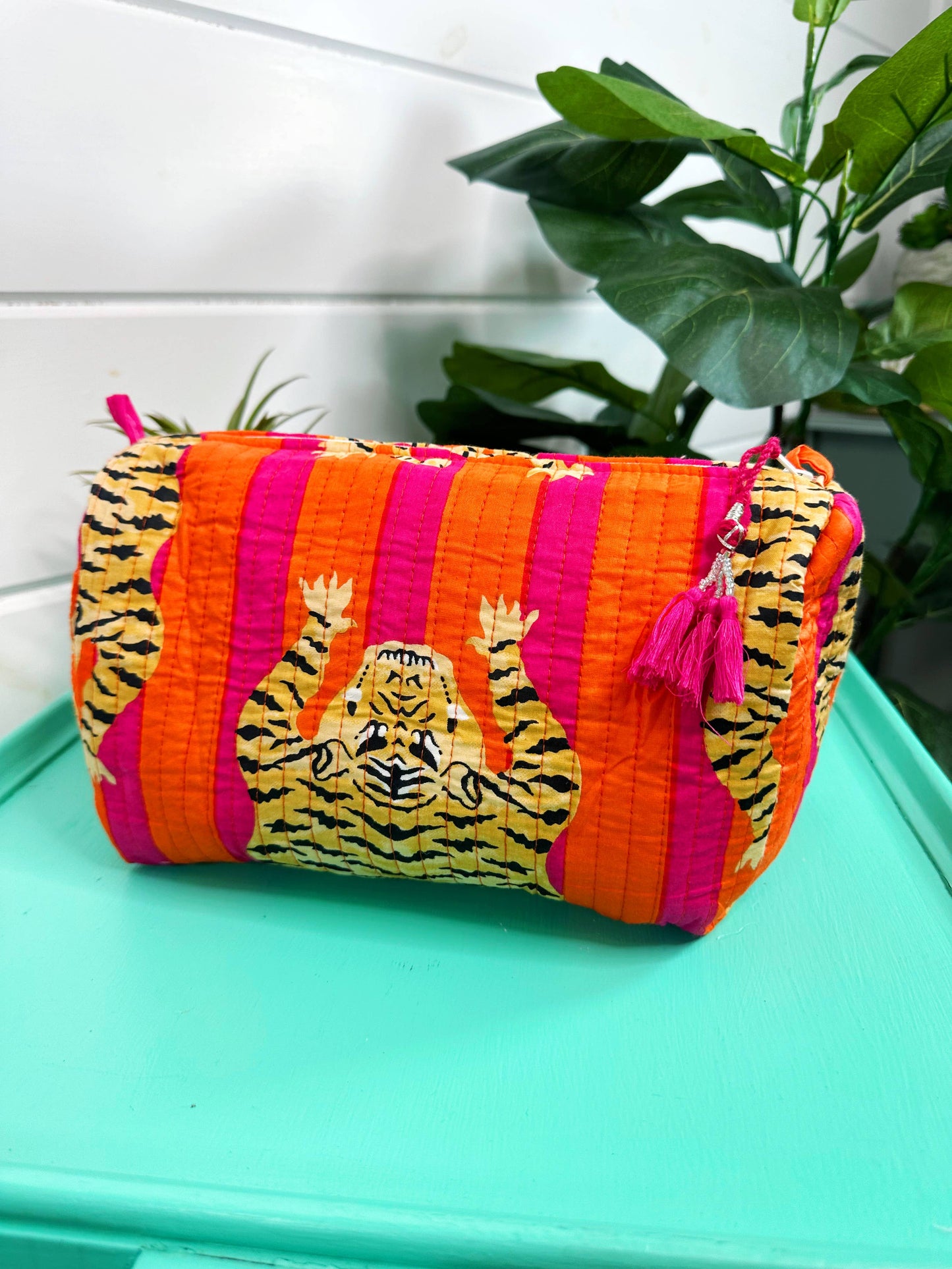 QUILTED TOILETRIES BAG: CORAL TIGER