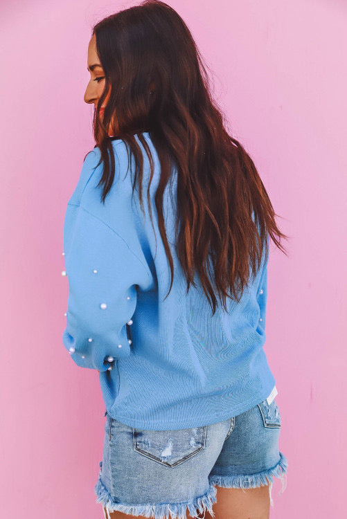 LIGHT BLUE PEARL SWEATER