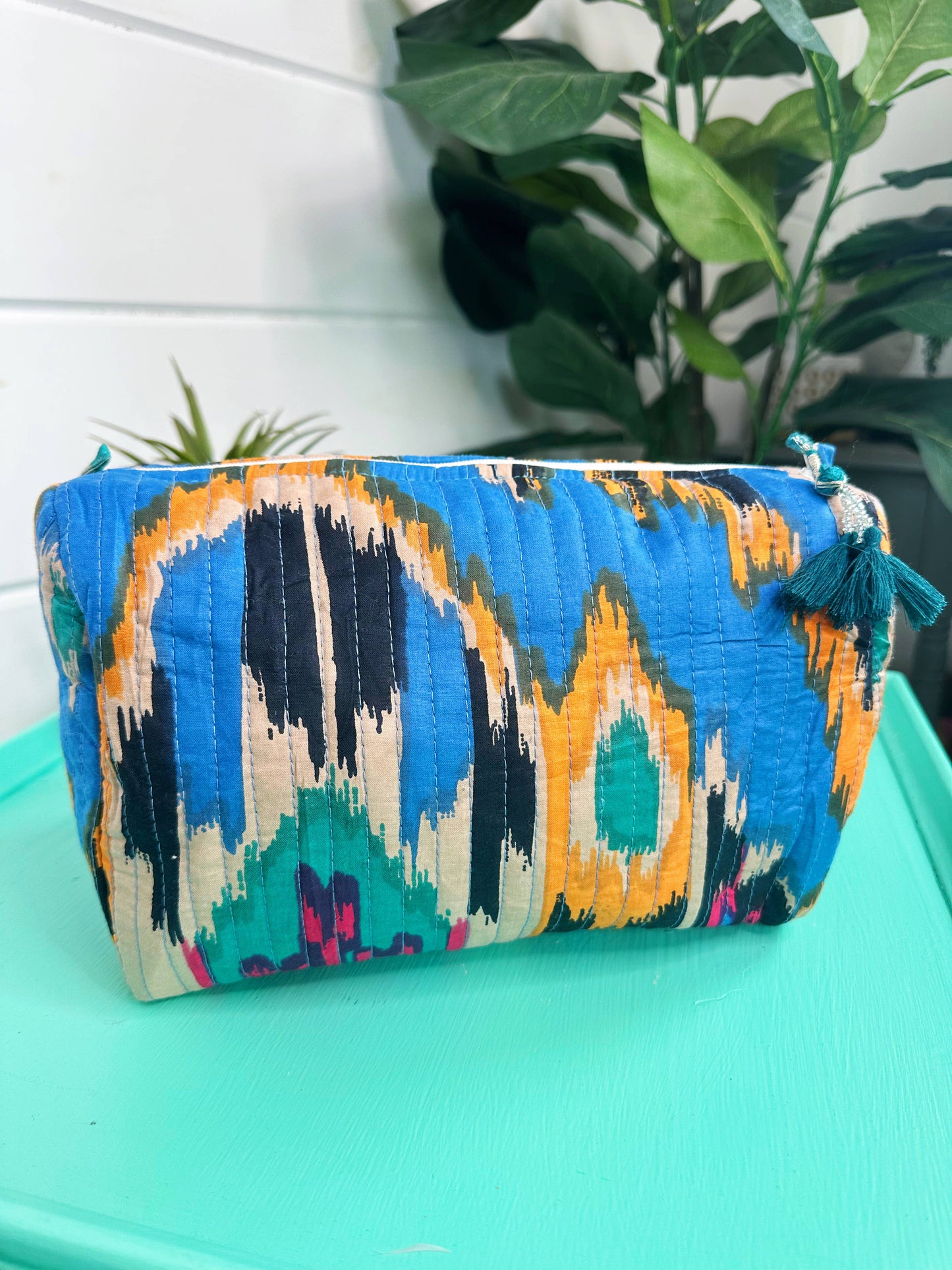 QUILTED TOILETRIES BAG: BLUE IKAT