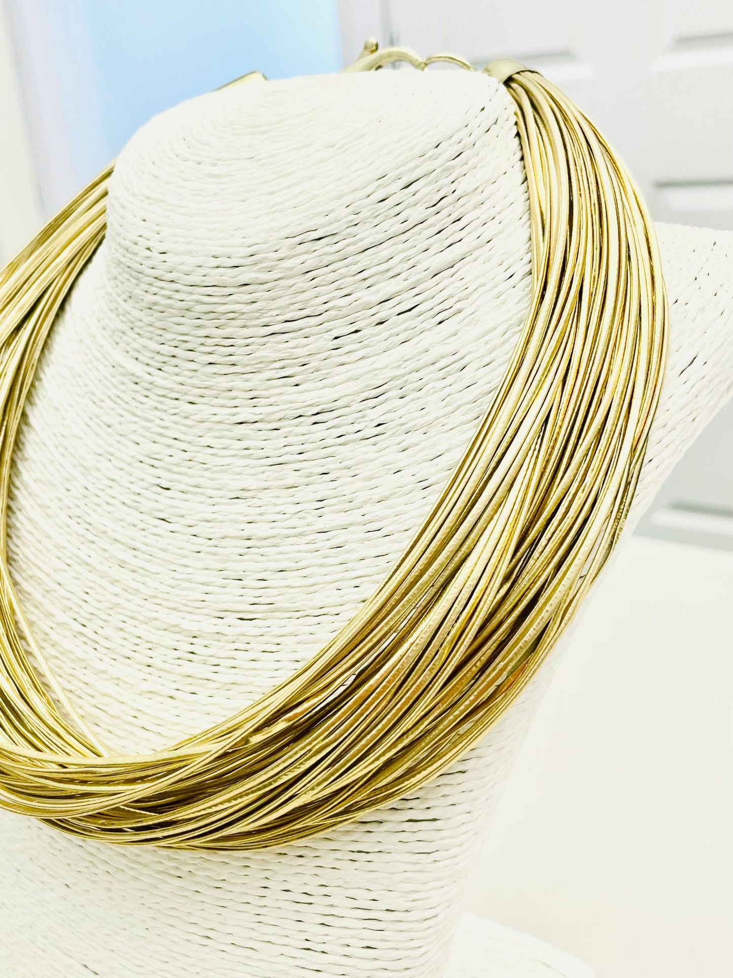 CHIC MULTI STRAND NECKLACE: GOLD